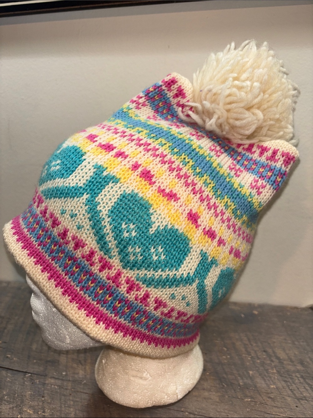 Smiley Wool Cream Pom Beanie with Teal, Pink & Yellow Pattern
